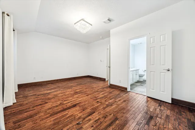 a spacious bathroom with a double vanity sink mirror double and shower