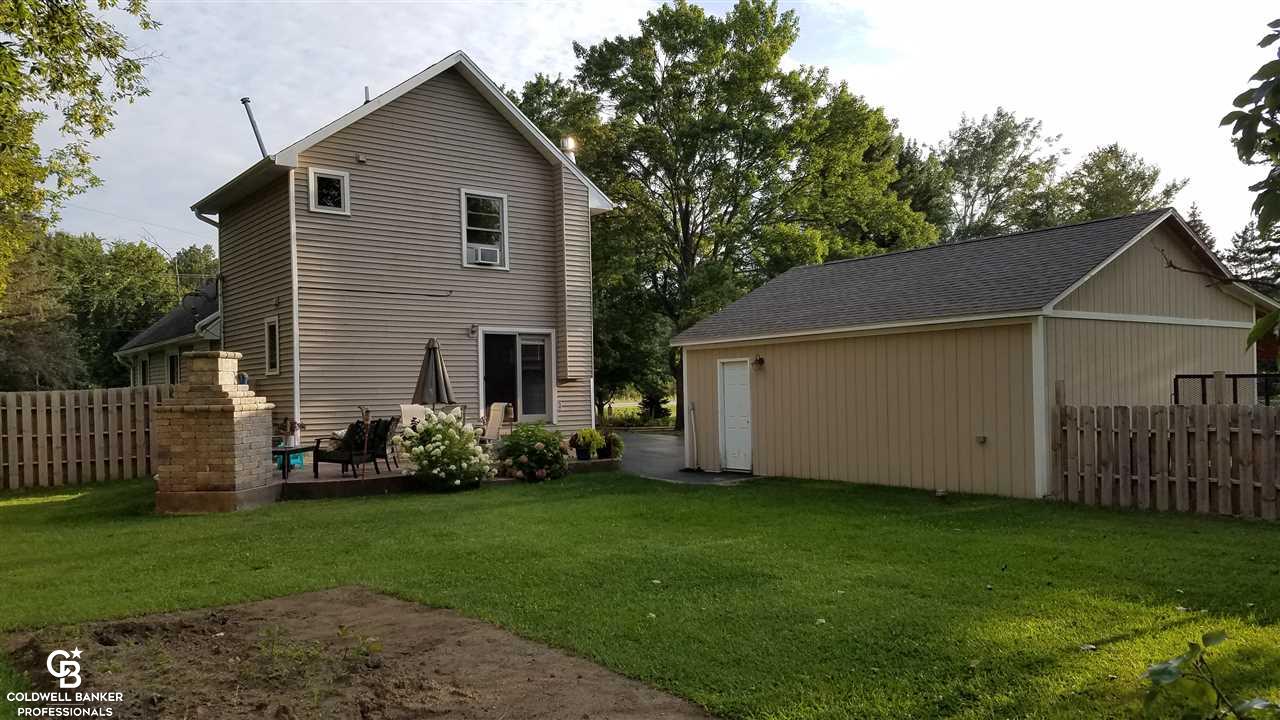7630 Lapeer Road Avoca, MI 48006 - Photo 14 of 24 This is a view of the back of the home.