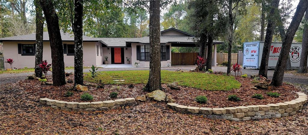 165 Franklin Road Lake Mary, FL 32746 - Photo 1 of 1 a front view of a house with garden