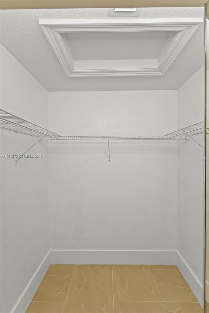 4116 Southwest 179th Way Miramar, FL 33029 - Photo 23 of 43 a view of a room with racks on the wall