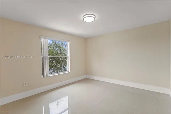 an empty room with a window