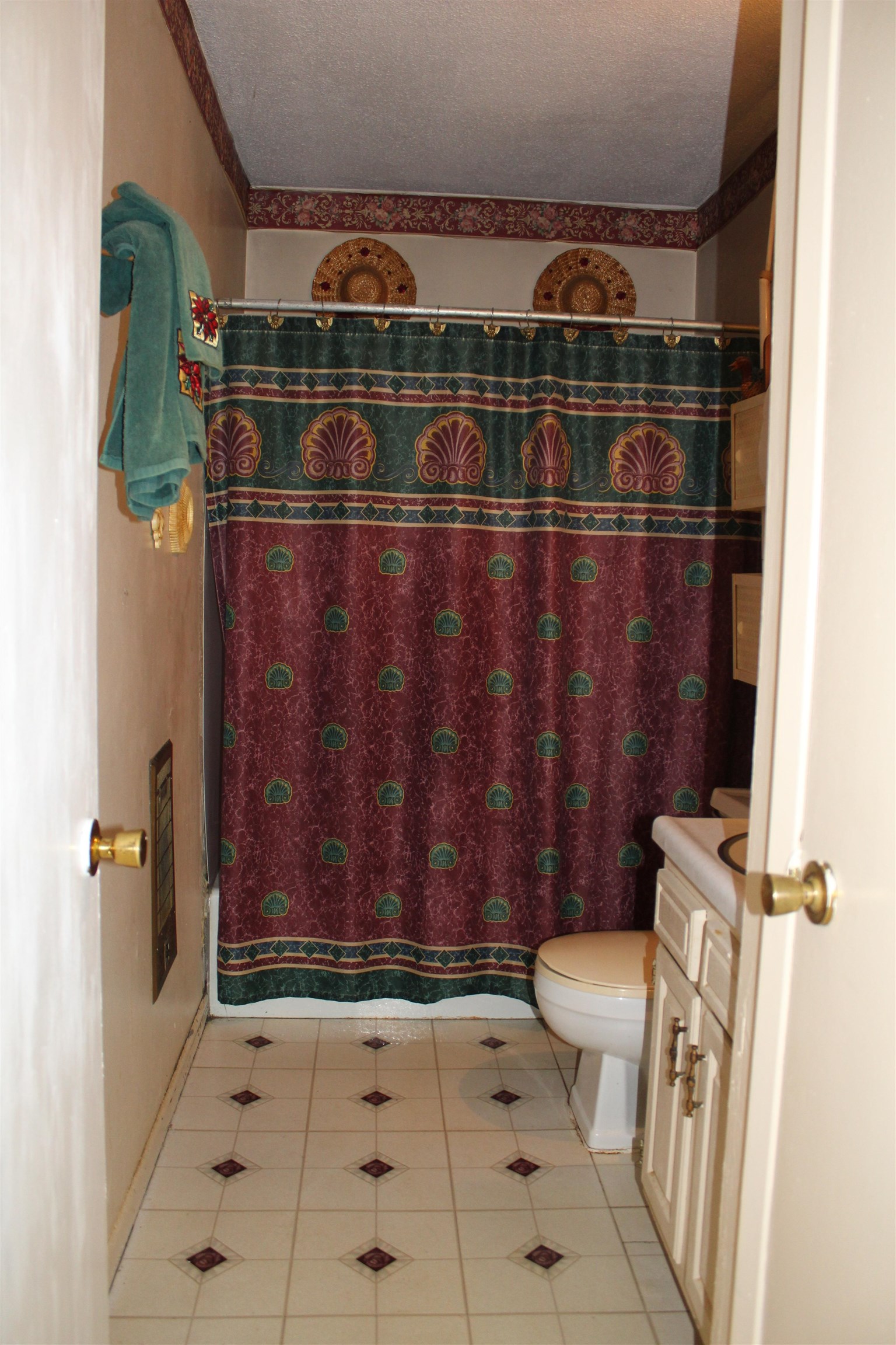 135 Ross Road Ripley, TN 38063 - Photo 12 of 18 a view of bathroom with a shower and a toilet