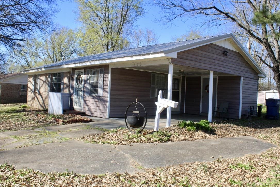 135 Ross Road Ripley, TN 38063 - Photo 17 of 18 a front view of a house with garden