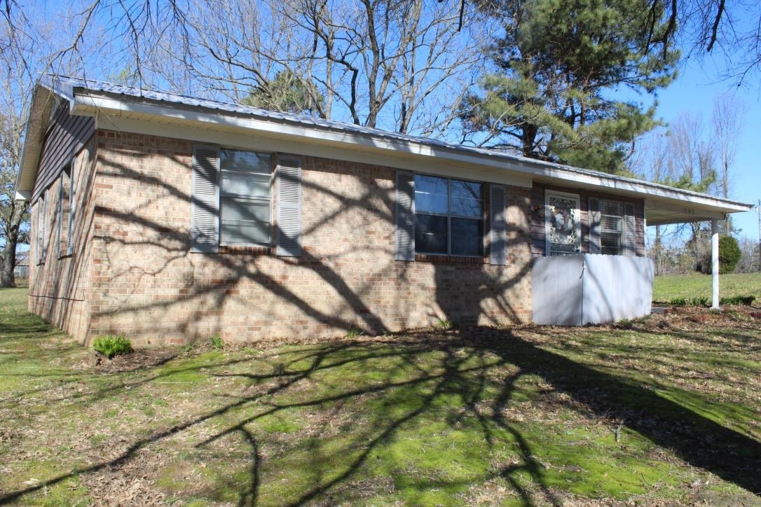 135 Ross Road Ripley, TN 38063 - Photo 2 of 18 a view of a house with a yard