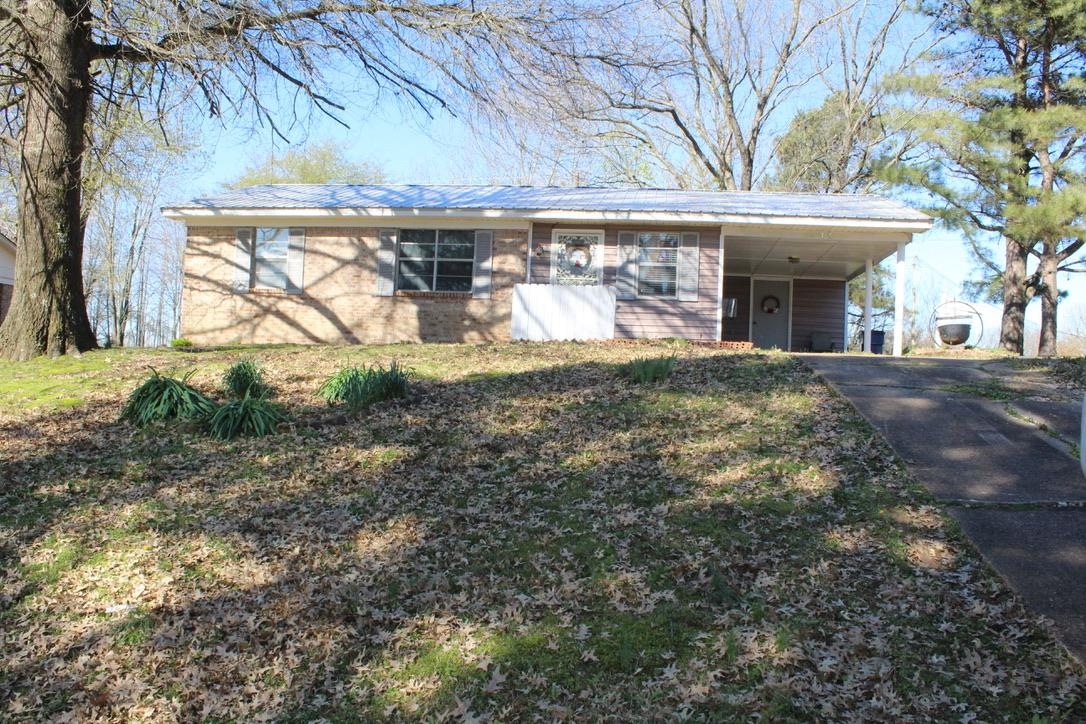 135 Ross Road Ripley, TN 38063 - Photo 3 of 18 a view of a house with a tree