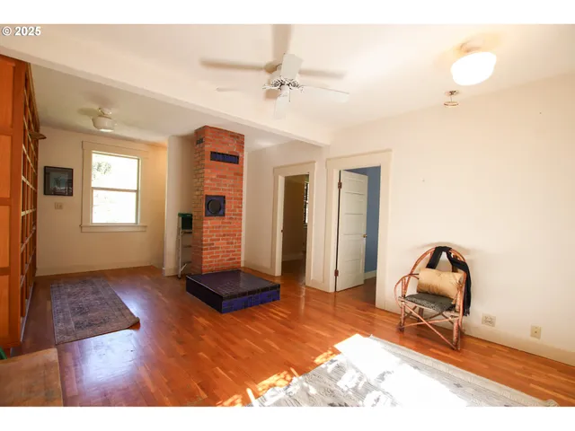 a view of wooden floor in an empty room