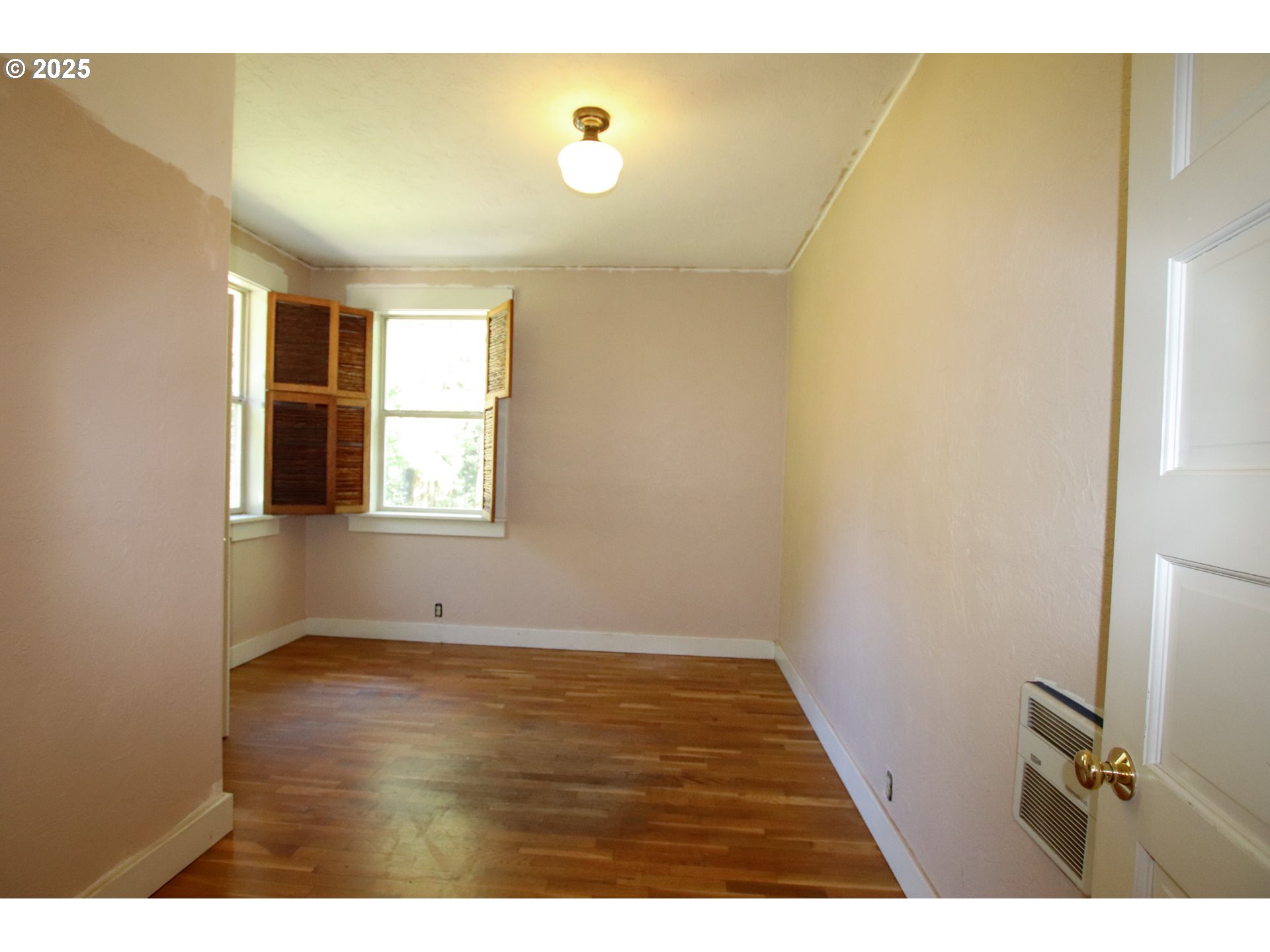 92976 Deadwood Creek Road Deadwood, OR 97430 - Photo 28 of 46 a view of an empty room with wooden floor and a window