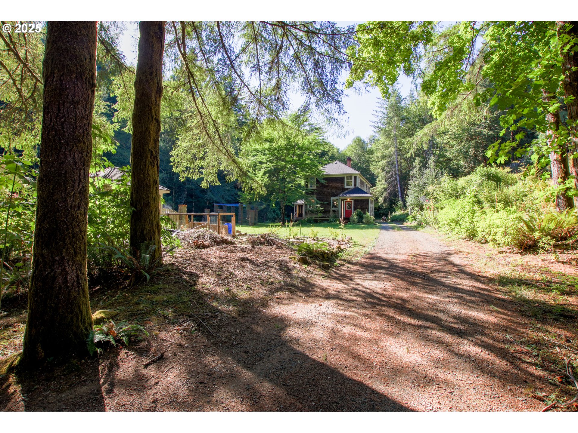 92976 Deadwood Creek Road Deadwood, OR 97430 - Photo 3 of 46 a view of a backyard with garden