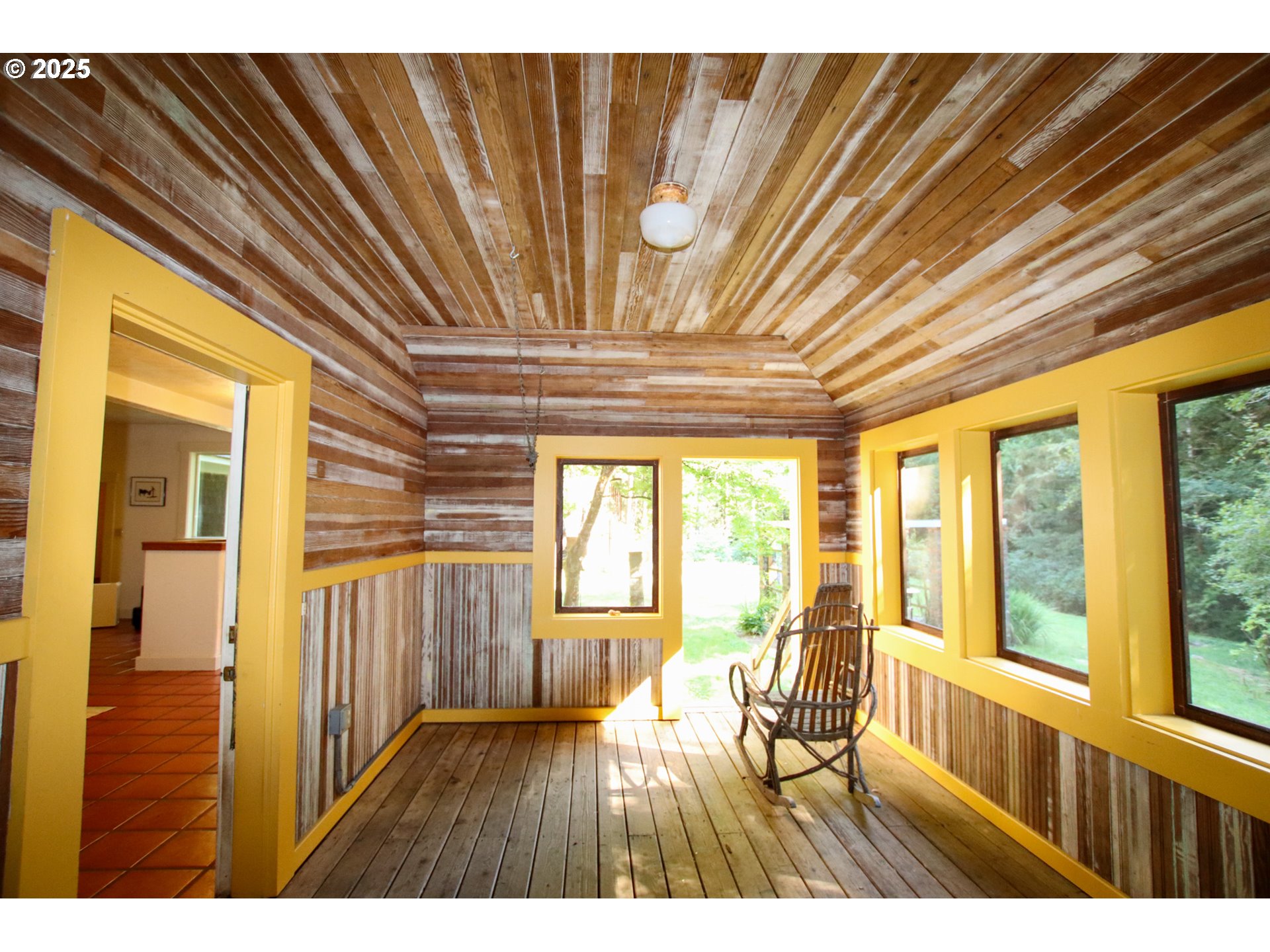 92976 Deadwood Creek Road Deadwood, OR 97430 - Photo 10 of 46 a view of an empty room with wooden floor and a window
