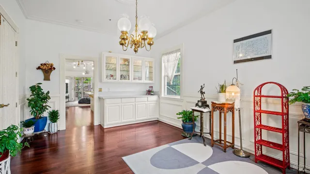 a living room with lots of furniture and a flat screen tv