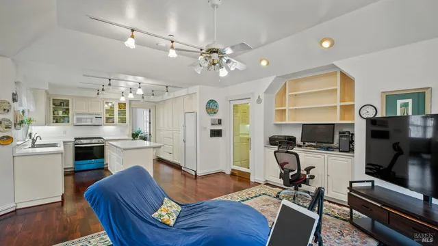 a balcony with wooden floor and fence