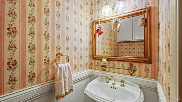 a room with a black white checkered floor and a window