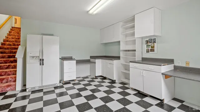 a view of a garden with a chair