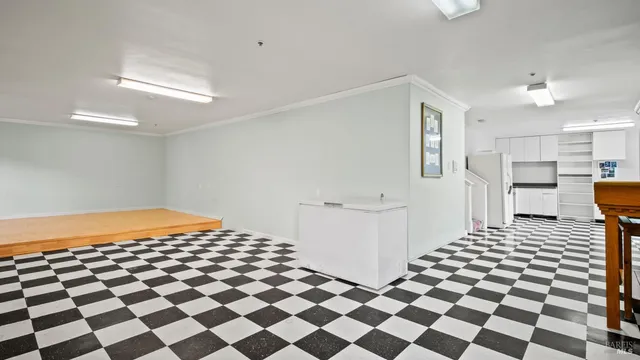 a view of backyard with large trees