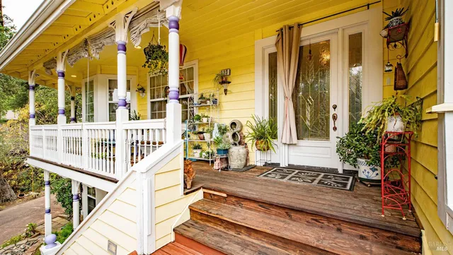 a view of balcony with furniture