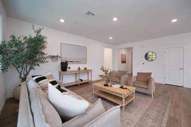 a kitchen with a table and chairs in it