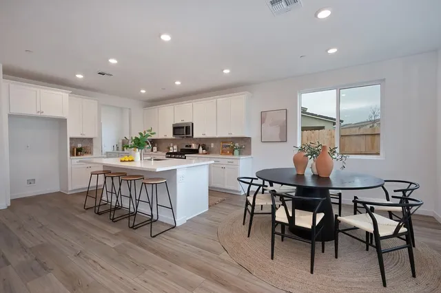 a view of a dining room with furniture