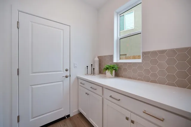a view of room with cabinets