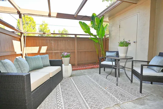 a outdoor living room with furniture