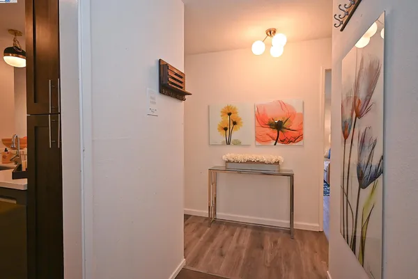 a room with a sink and a mirror