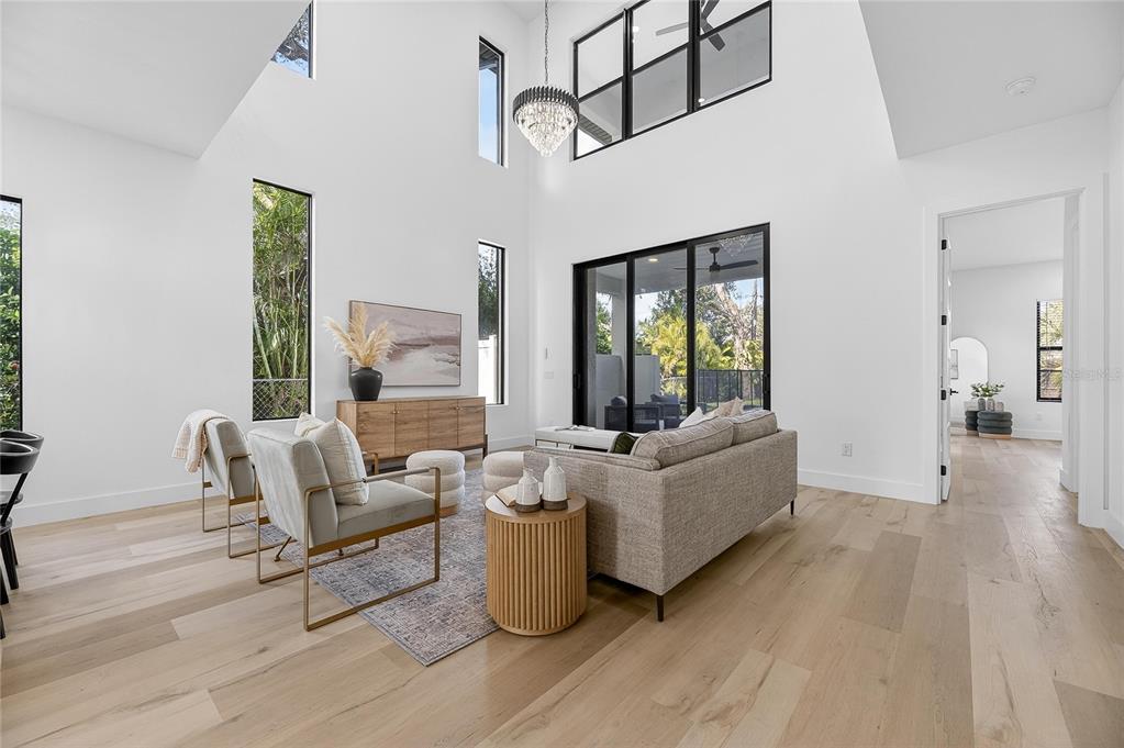 2335 Oak Terrace Sarasota, FL 34231 - Photo 27 of 82 a living room with furniture and a large window