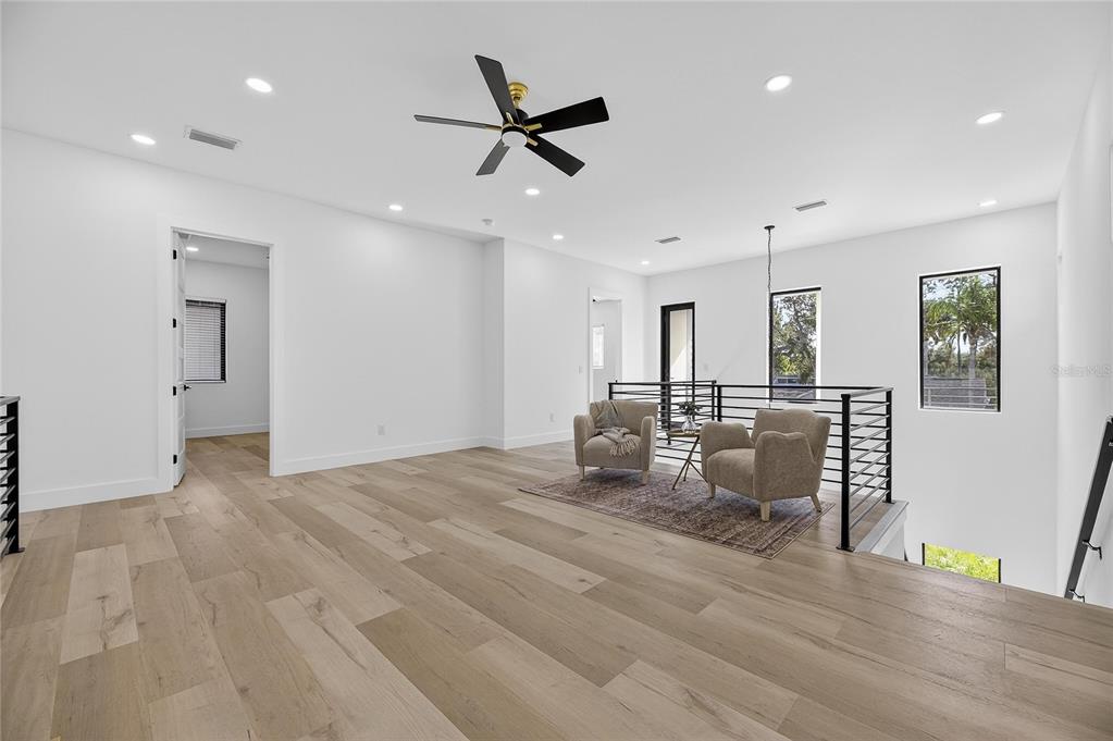 2335 Oak Terrace Sarasota, FL 34231 - Photo 39 of 82 a view of a livingroom with furniture and a ceiling fan