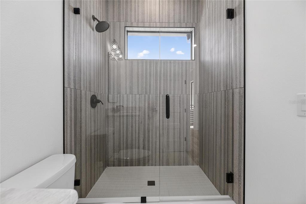 2335 Oak Terrace Sarasota, FL 34231 - Photo 47 of 82 a bathroom with a shower