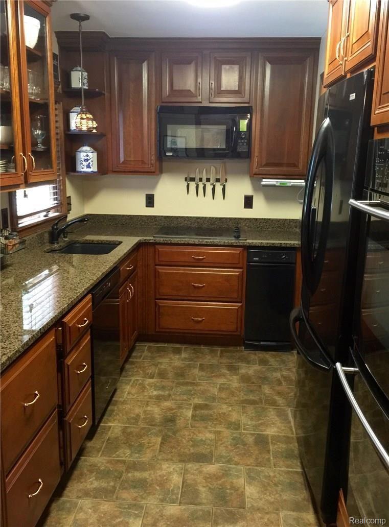 2478 Pembroke Road Birmingham, MI 48009 - Photo 17 of 38 Stunning cherry, granite & ceramic kitchen includes all appliances