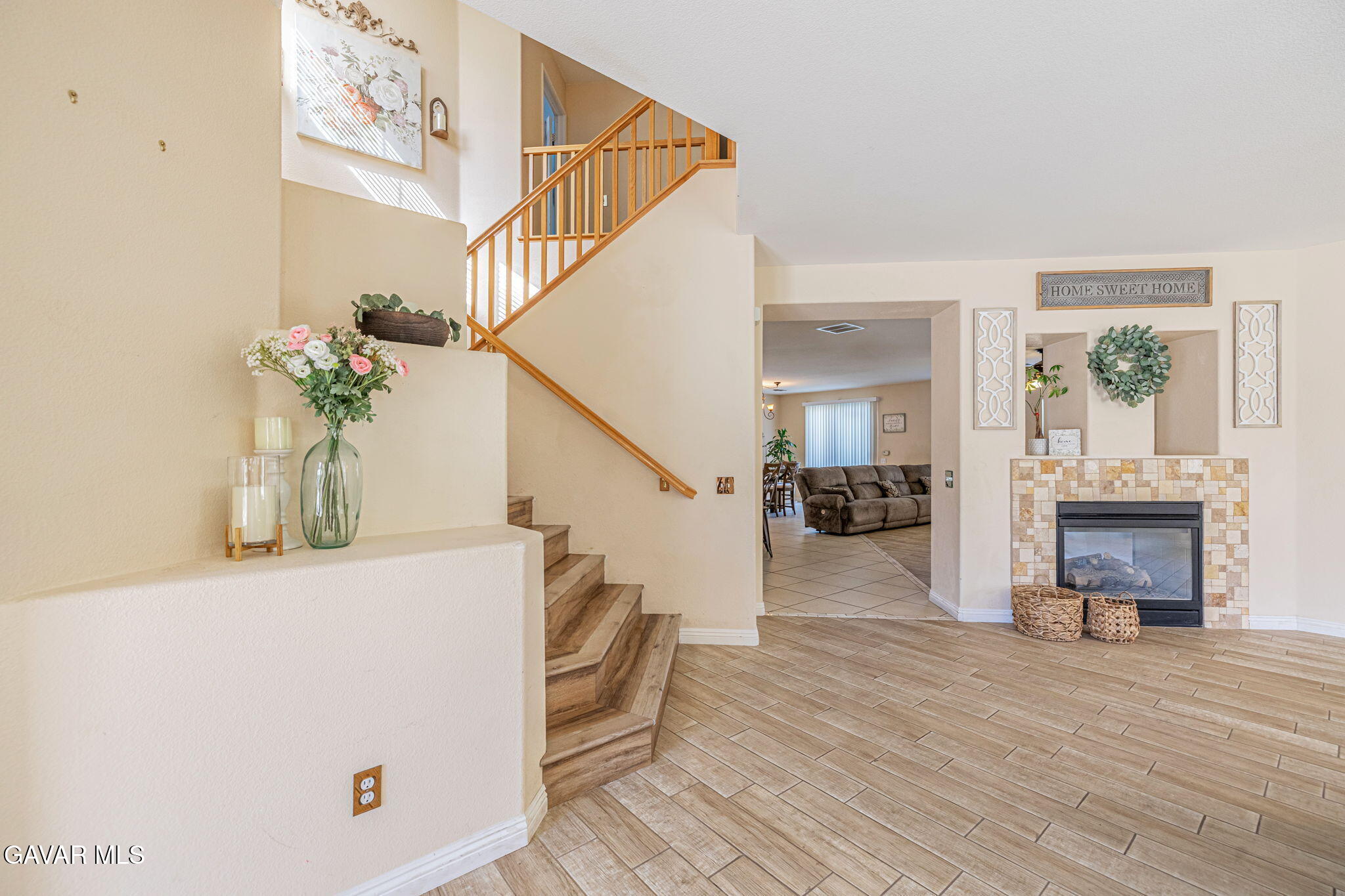 4302 Olivera Place Lancaster, CA 93536 - Photo 14 of 62 a view of entryway and hall with wooden floor