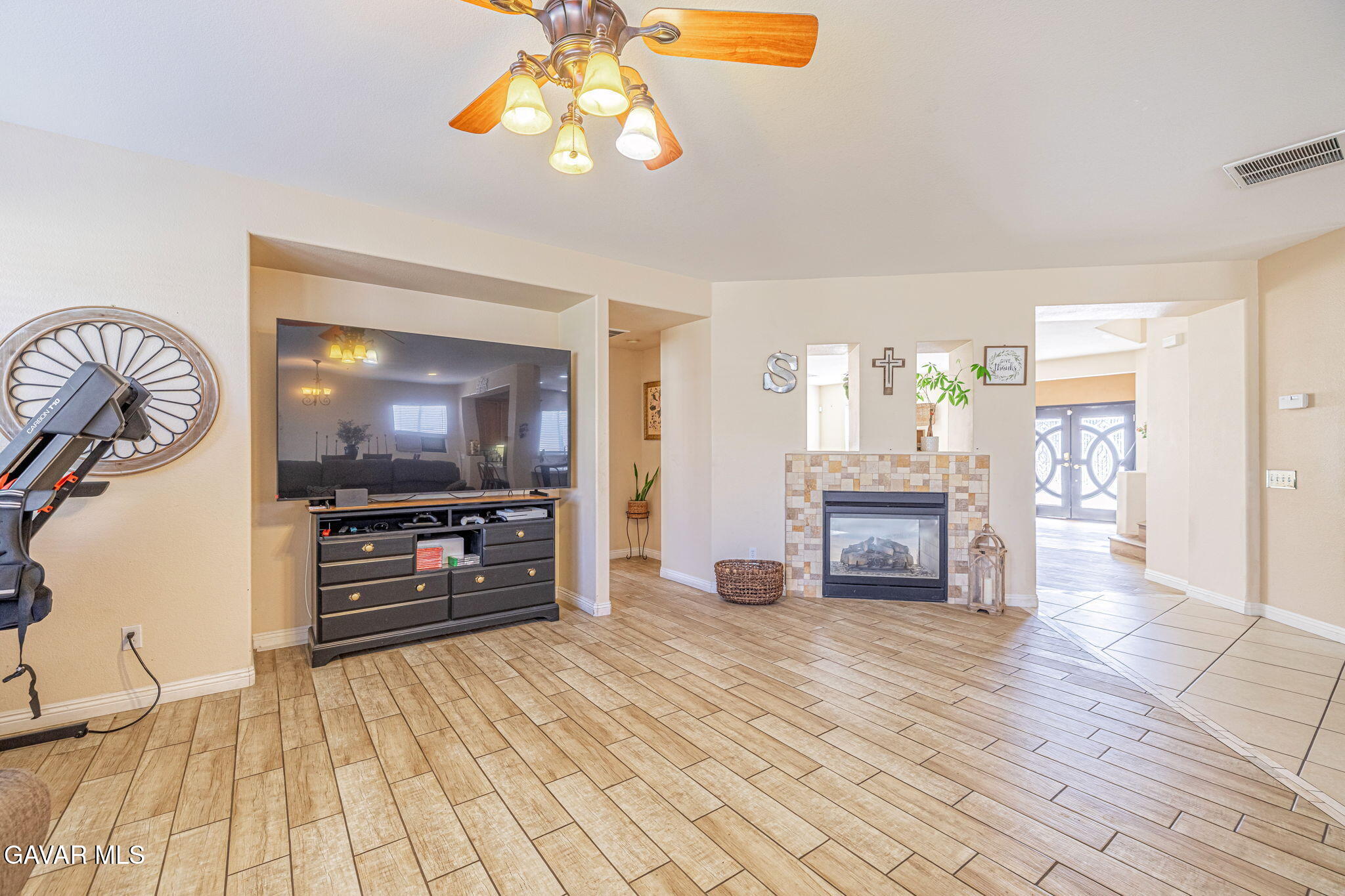 4302 Olivera Place Lancaster, CA 93536 - Photo 16 of 62 a living room with furniture and a flat screen tv