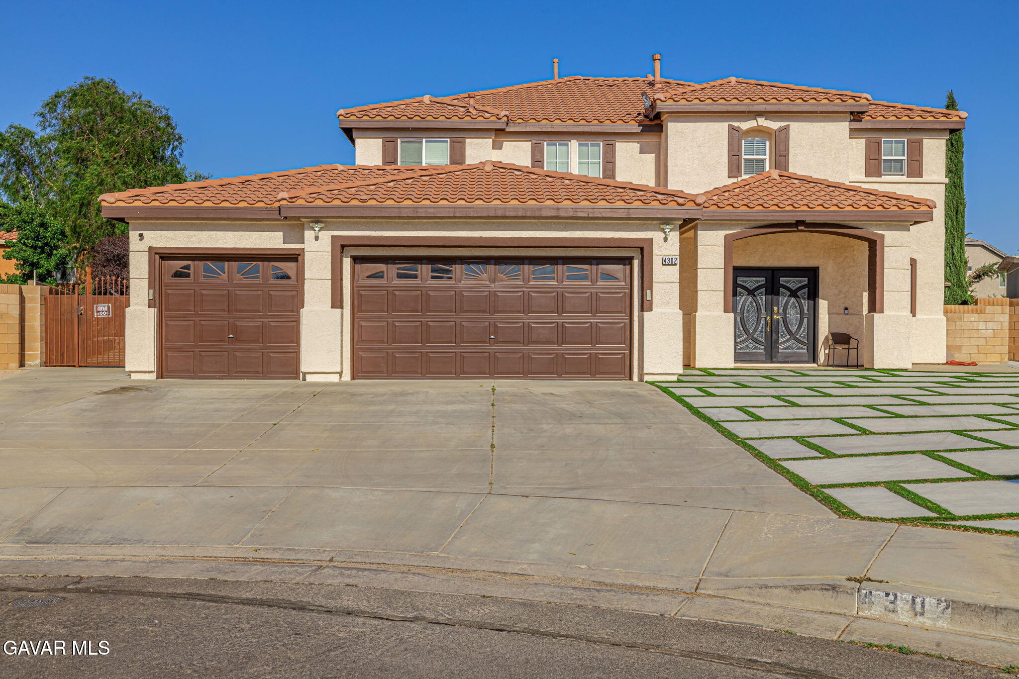 4302 Olivera Place Lancaster, CA 93536 - Photo 2 of 62 a front view of a house