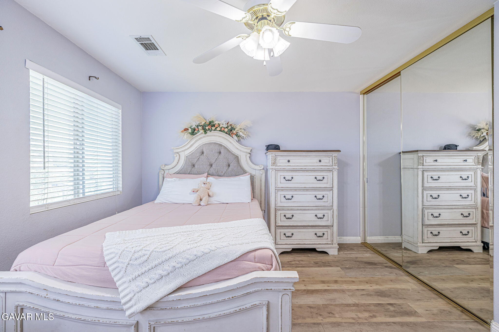 4302 Olivera Place Lancaster, CA 93536 - Photo 40 of 62 a bedroom with a bed and a window