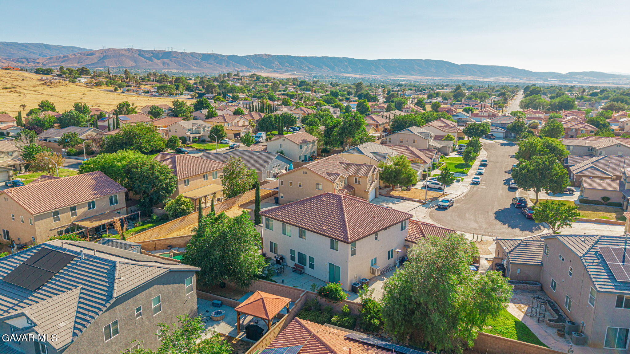 4302 Olivera Place Lancaster, CA 93536 - Photo 58 of 62 an aerial view of residential houses with outdoor space
