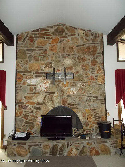 7 Sheffield Road Amarillo, TX 79124 - Photo 9 of 20 fireplace in main living area