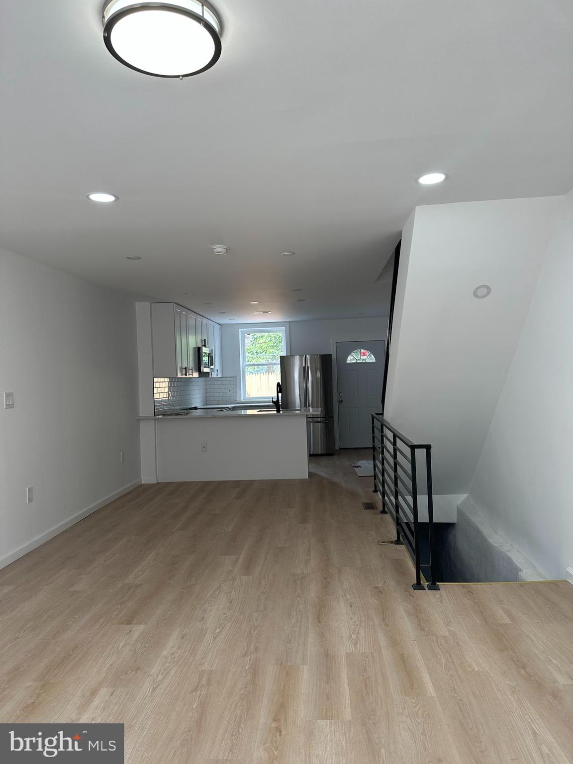 1929 Titan Street Philadelphia, PA 19146 - Photo 20 of 20 a view of empty room with wooden floor and windows