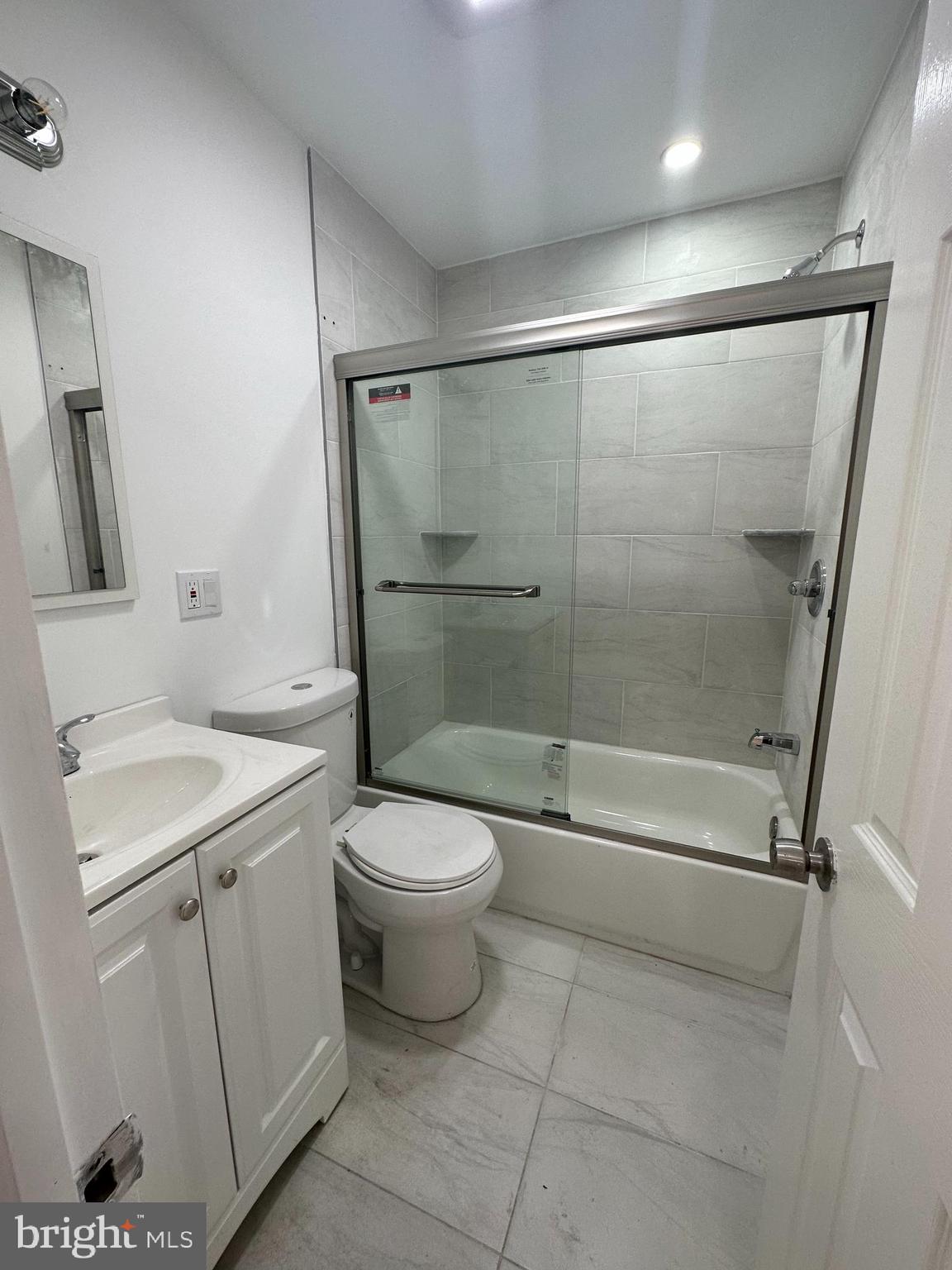 1929 Titan Street Philadelphia, PA 19146 - Photo 5 of 20 a bathroom with a shower a toilet and a sink