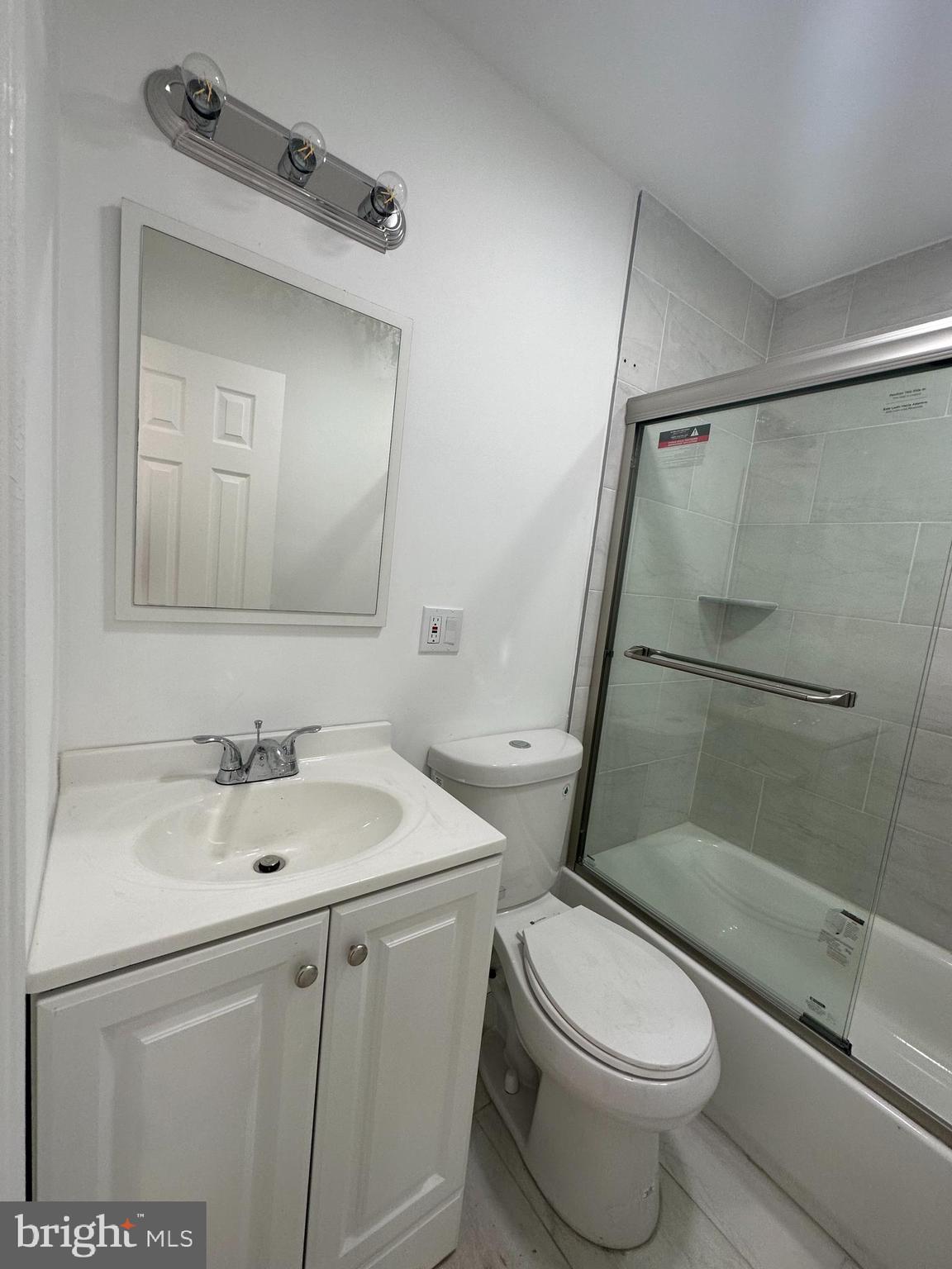 1929 Titan Street Philadelphia, PA 19146 - Photo 6 of 20 a bathroom with a sink toilet and shower