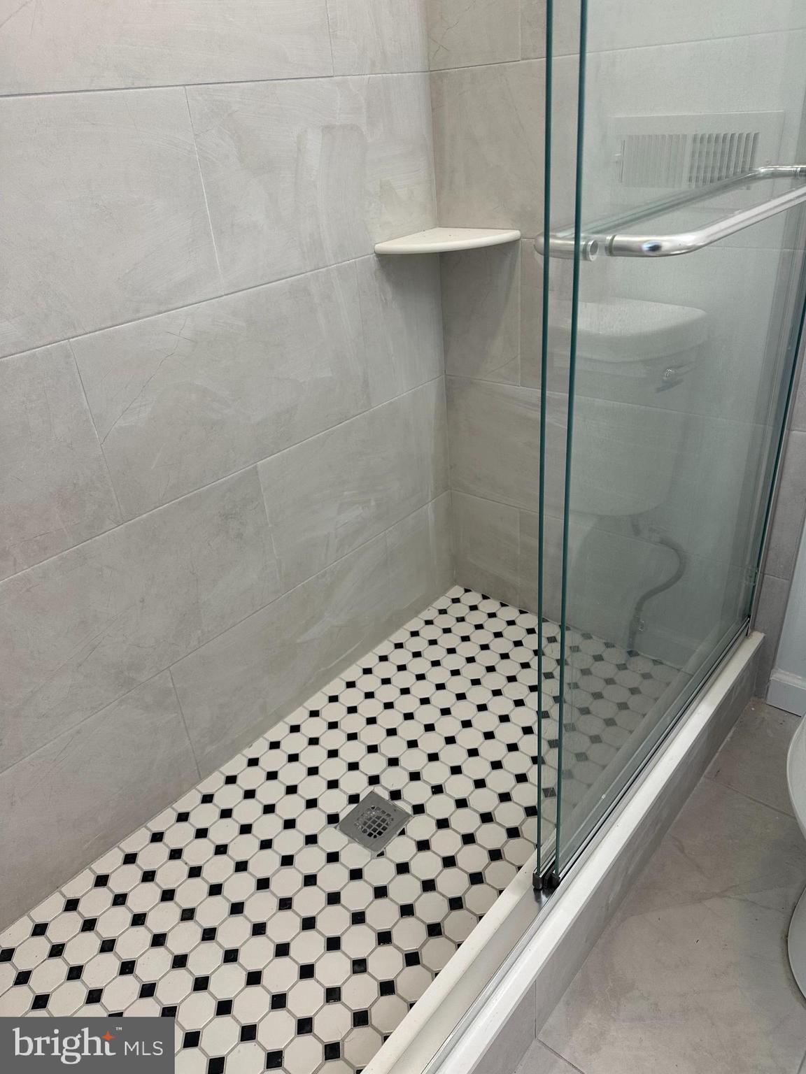 1929 Titan Street Philadelphia, PA 19146 - Photo 7 of 20 a bathroom with a shower and a sink