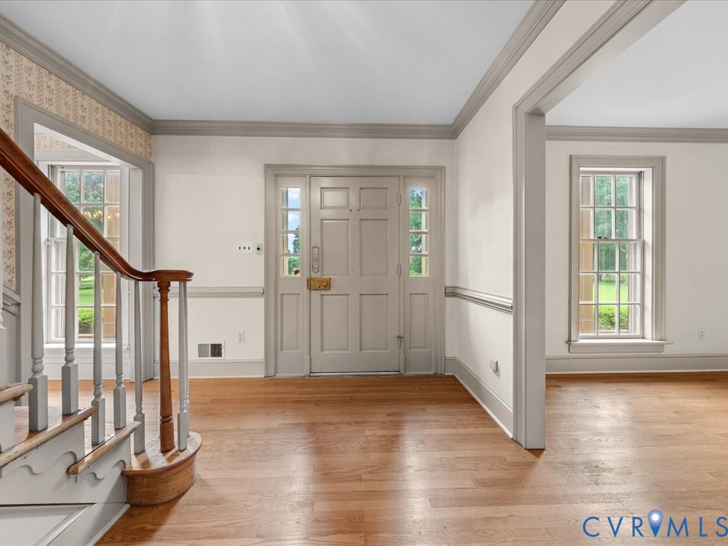 7350 State Rte 1196 Mechanicsville, VA 23111 - Photo 11 of 50 Foyer entrance featuring ornamental molding, light