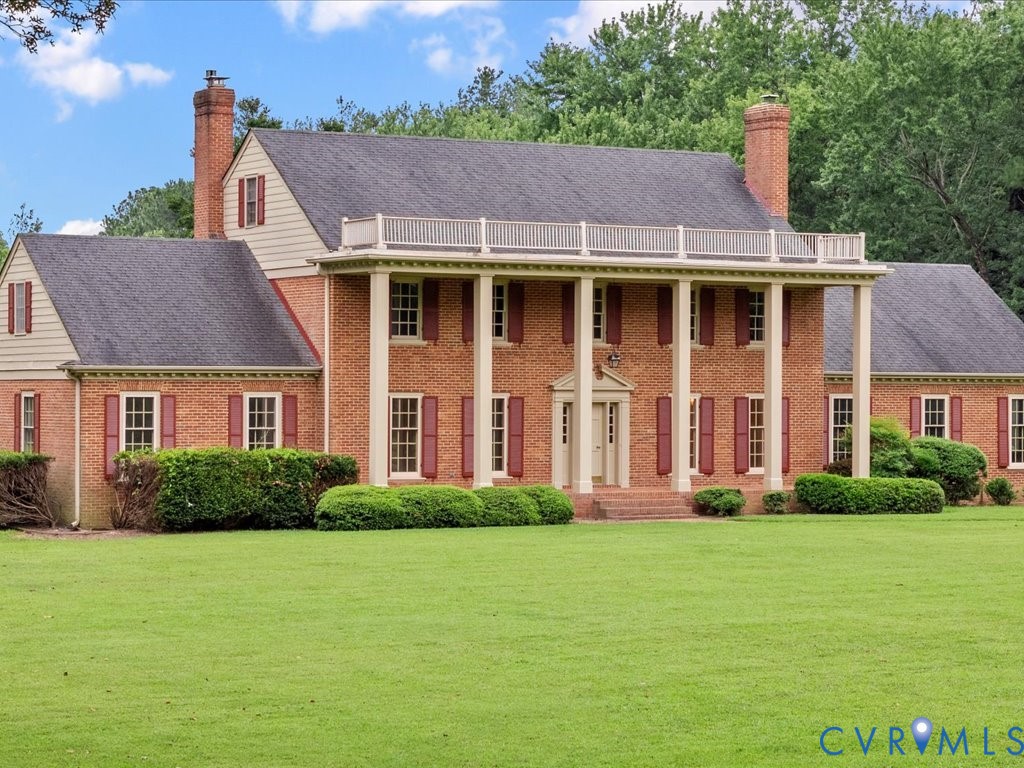 7350 State Rte 1196 Mechanicsville, VA 23111 - Photo 4 of 50 a front view of a house with a yard