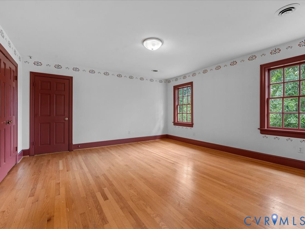 7350 State Rte 1196 Mechanicsville, VA 23111 - Photo 43 of 50 an empty room with wooden floor and windows