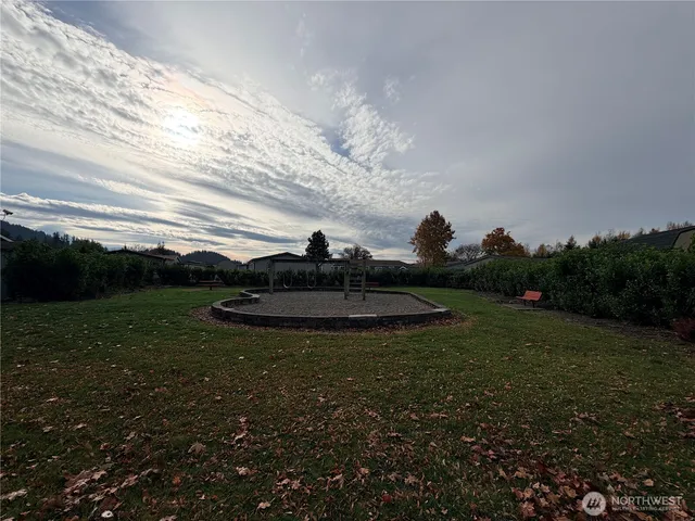 a view of a garden with an outdoor space