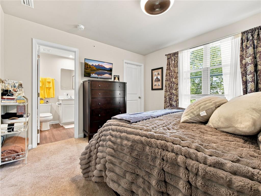 2133 Cross Country Road Northampton, PA 18067 - Photo 36 of 44 Plush carpeting and an en-suite bathroom enhance this comfortable bedroom retreat.