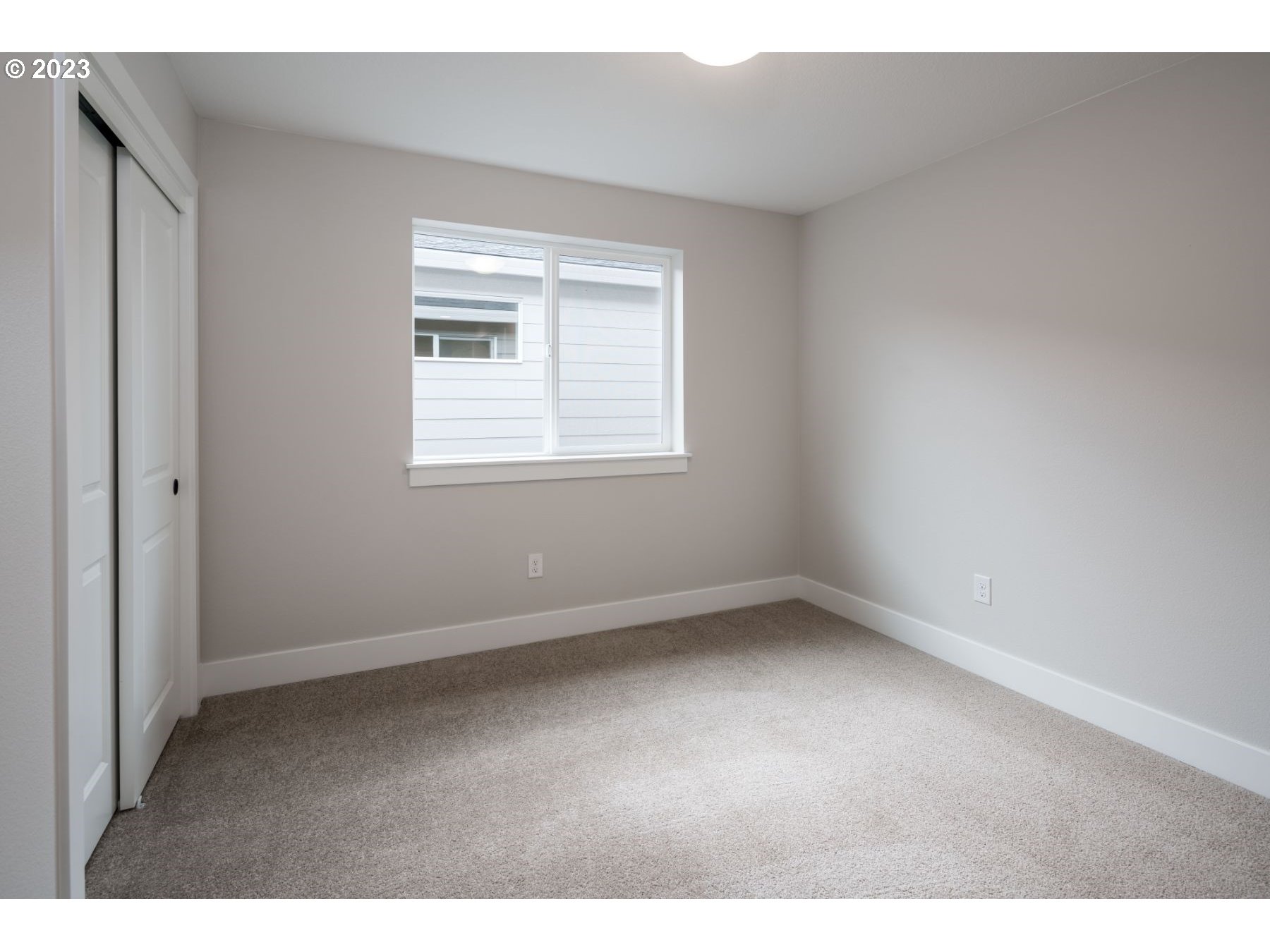 17531 Northwest 7th Avenue Ridgefield, WA 98642 - Photo 23 of 27 an empty room with a window