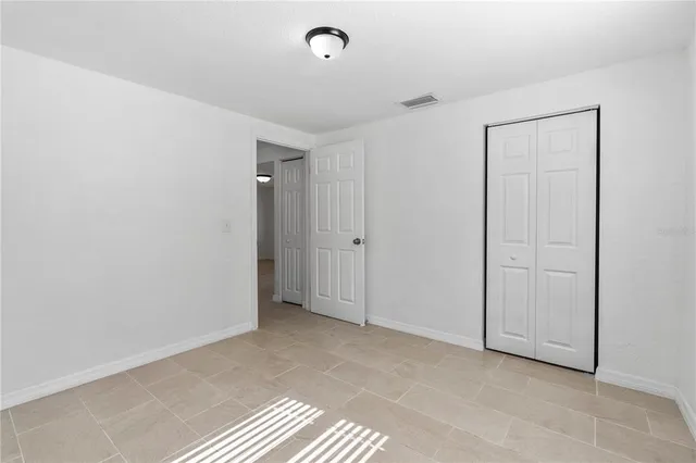 a view of yard with swimming pool and green space