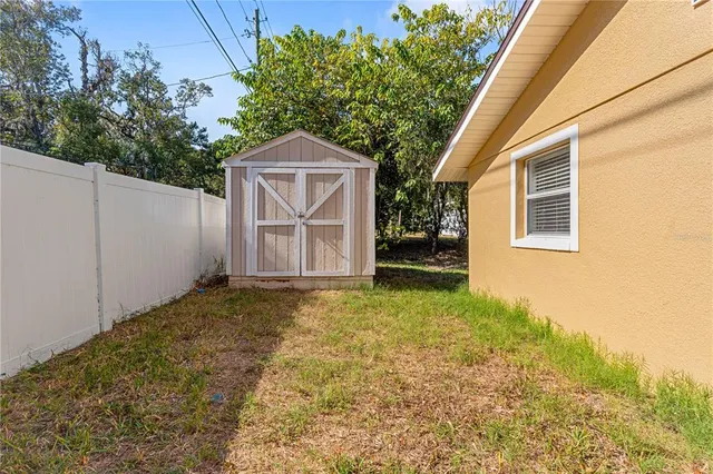 a house with trees in front of it