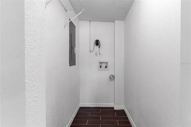 a view of a room with rack on the wall