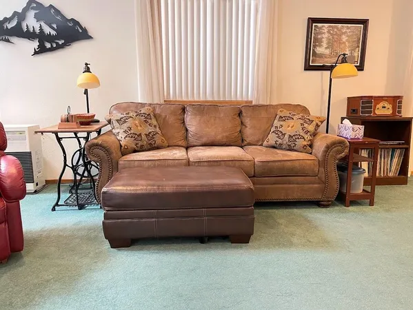 a living room with furniture and a couch