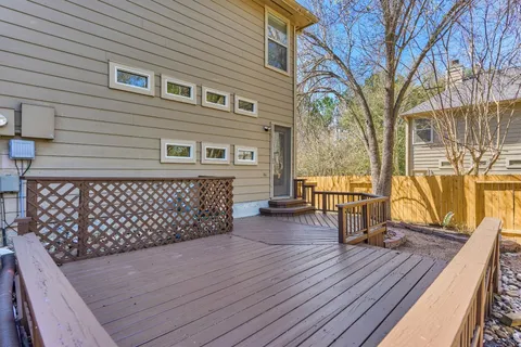 an aerial view of a house with yard and outdoor seating