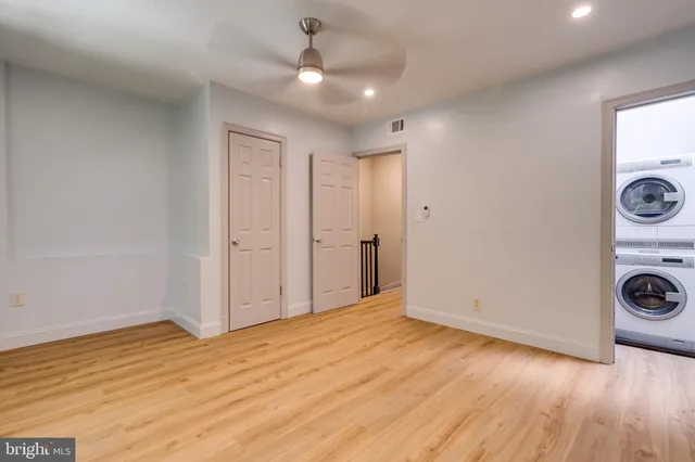 a view of a livingroom with wooden floor